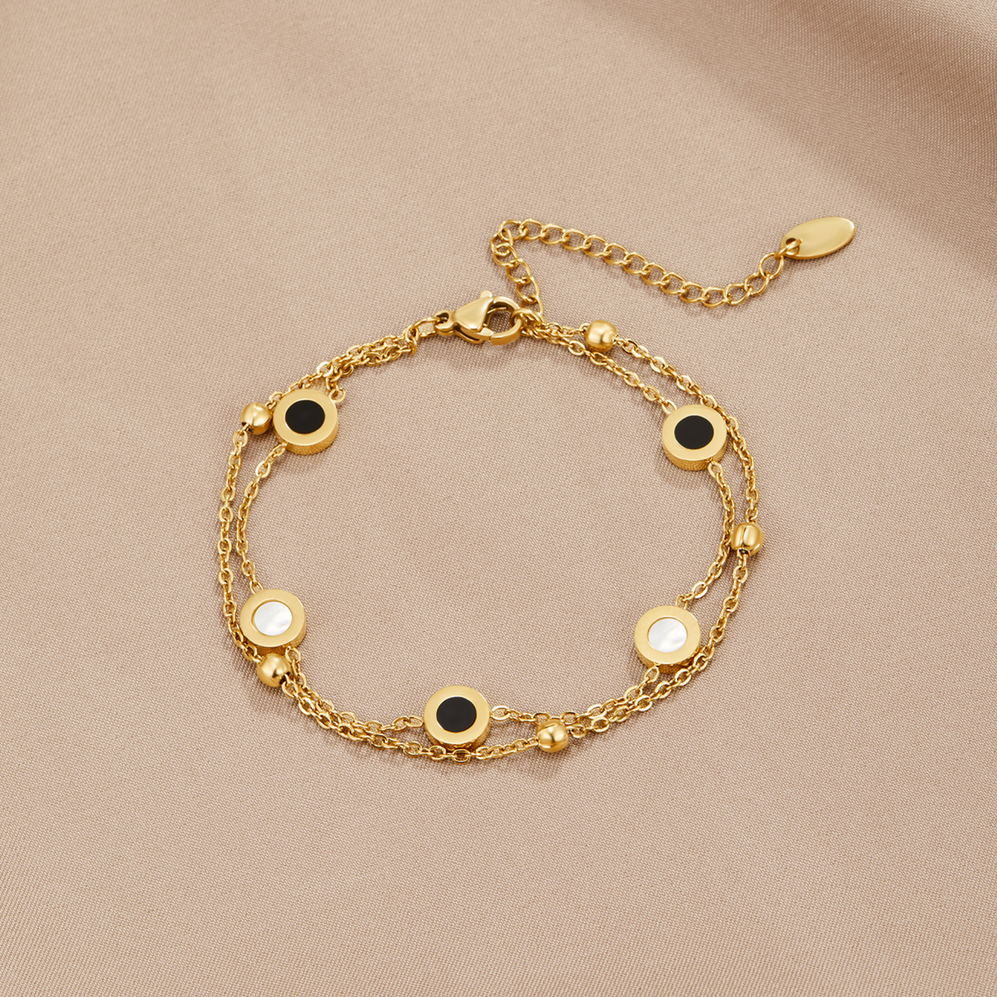 Bracelet en onyx et pierre blanche