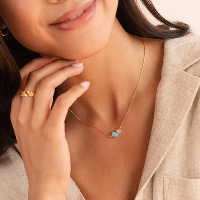 Collier avec pierre porte-bonheur en cristal