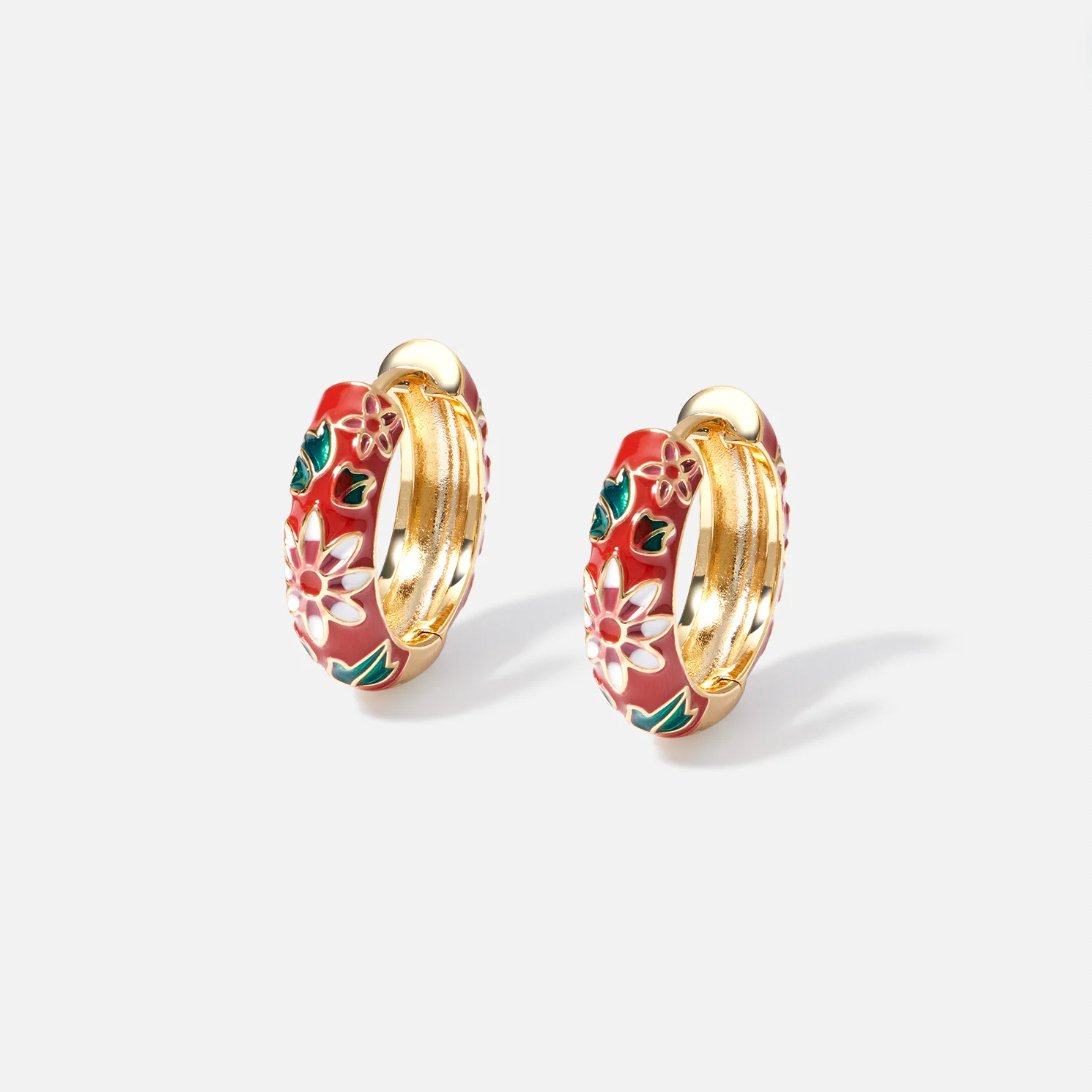 Boucles d'oreilles en or avec des fleurs