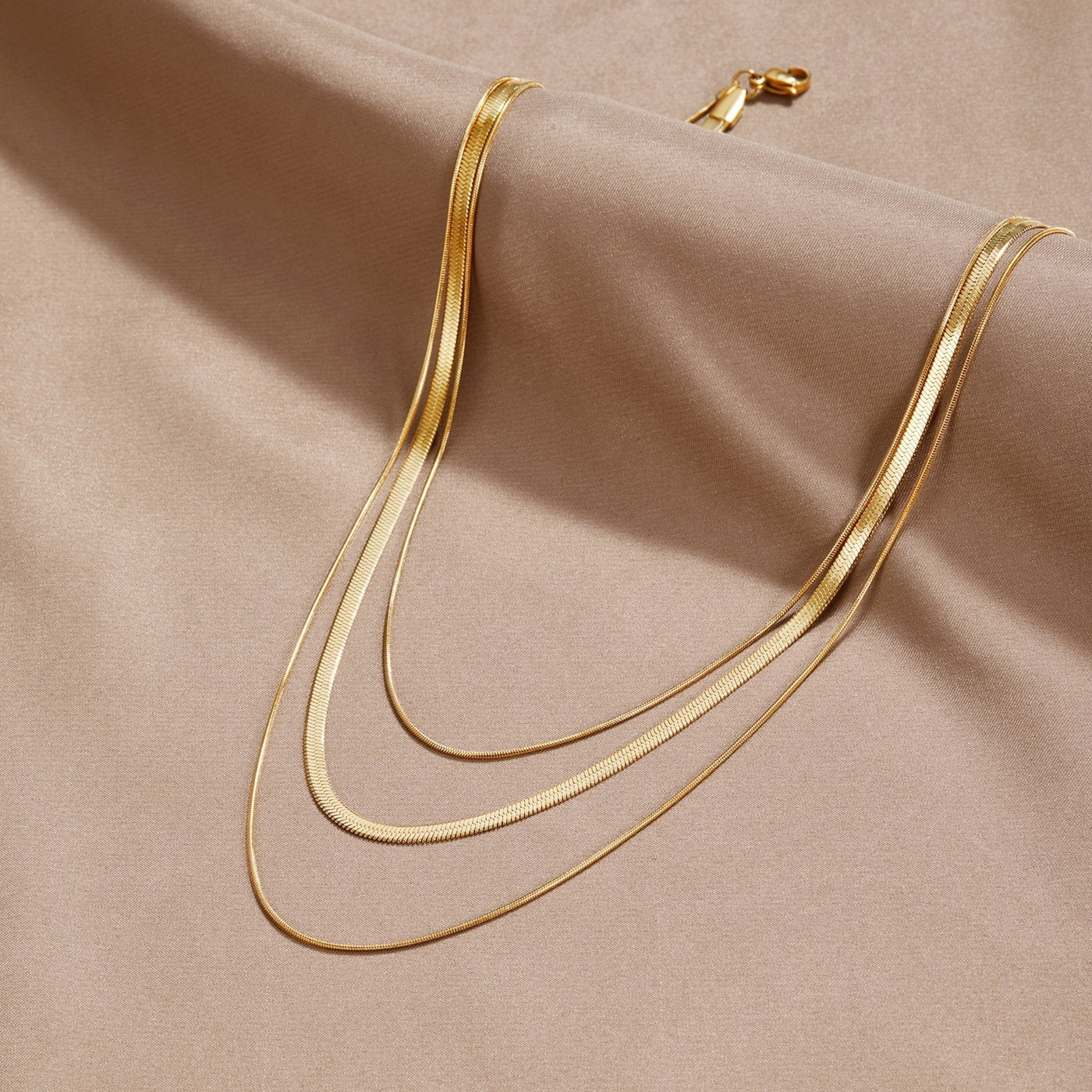Collier à chaîne multistrat en or