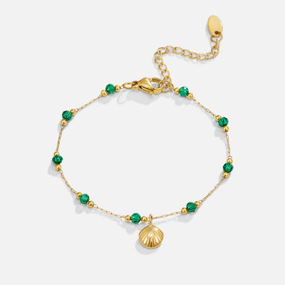 Bracelet Nerissa avec coquillage doré et perles vertes