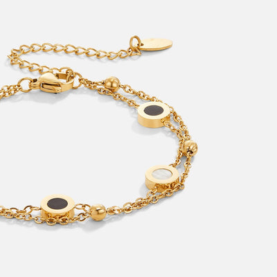Bracelet en onyx et pierre blanche