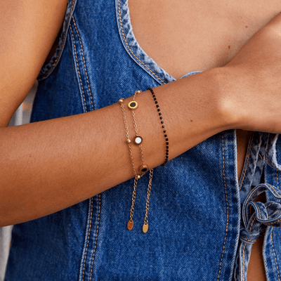 Bracelet en onyx et pierre blanche